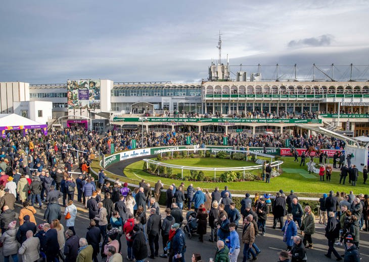 The crowds at a racecourse.