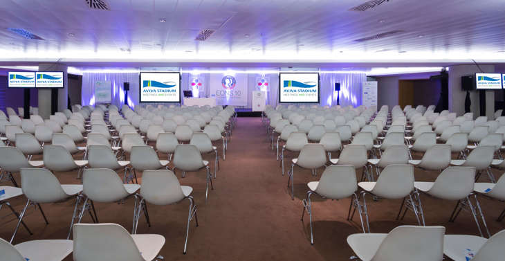 Chairs laid out for a conference or speech in the Presidents Suite hall.