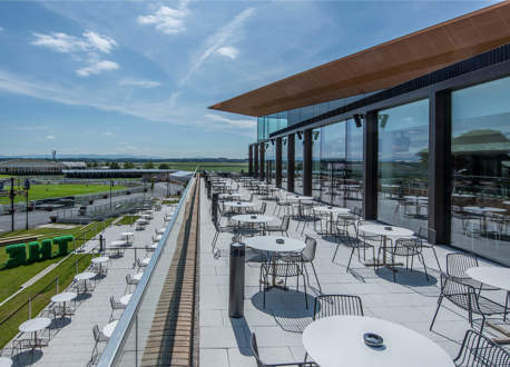 A rooftop patio dining area at The Curragh.