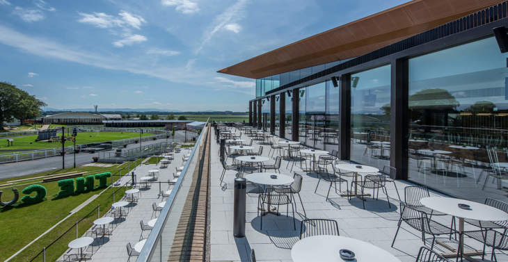 A rooftop patio dining area at The Curragh.